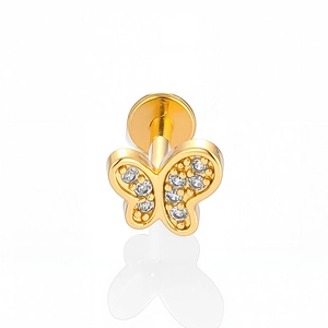 Vue détaillée du labret papillon doré serti de zircons avec tige à l'arrière plat