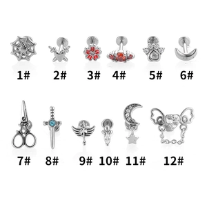 Set mit 12 Spinnennetz und Schwert Piercings aus 316L Edelstahl mit flacher Rückseite