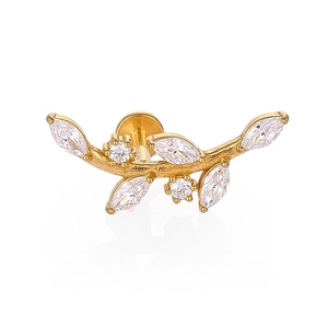 Detailed view of leaf-shaped gold labret stud with marquise-cut marquise zircon crystals