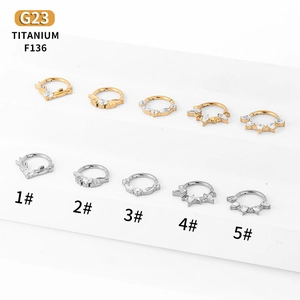 Anelli per setto in titanio G23 con zirconi in design geometrici a cuore e stella