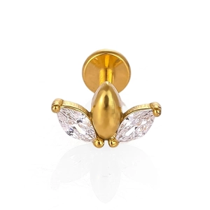 Macro shot of gold leaf crown stud with marquise cubic zirconia and flat back base
