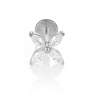 Macro shot of silver flower labret stud with marquise-cut cubic zirconia and flat back