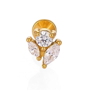 Macro view of gold leaf crown stud with flat back design and clear cubic zirconia stones