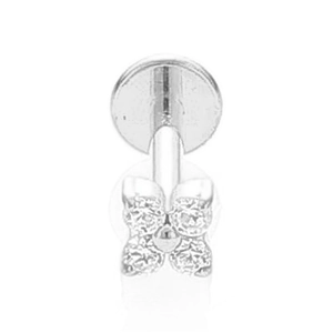 Dettaglio di un perno in titanio con un design a fiore a quattro petali in zircone lucido