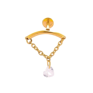 Detail of gold titanium lip stud with heart zircon pendant and delicate link chains