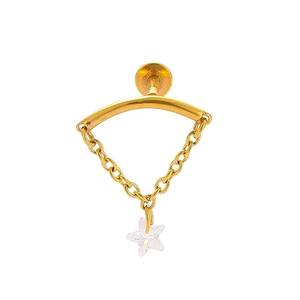 Detail of gold labret stud with dangling chain and clear star zircon pendant