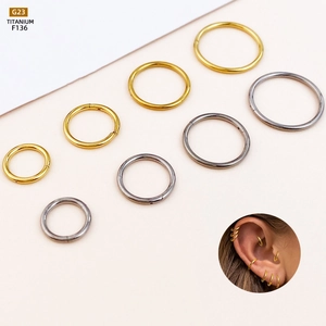 Multiple sizes of G23 titanium seamless hoops for nose and ears in gold and silver colors