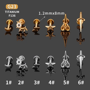 G23 titanium flat back labret studs featuring moon and lightning shapes in silver and gold