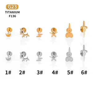 G23 Titanium moon and star flat back stud earrings in gold and silver finish set