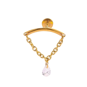 Close-up of golden V-shaped chain earring with a sparkling crystal teardrop pendant