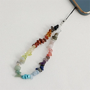 Detail view of handcrafted rainbow crystal stone phone strap with steel wire and silver clasp
