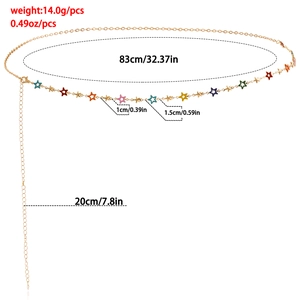 Detail of gold belly chain featuring colorful star charms and size measurements