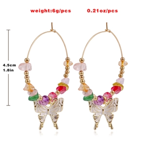 Bohemian colorful turquoise butterfly hoop earrings with vibrant beads and white enamel finish