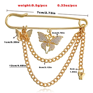 Tableau des tailles détaillé pour broche papillon dorée avec dimensions et poids