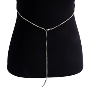Detailed close-up of a silver rhinestone body chain with adjustable lobster clasp