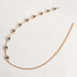 Gold body chain with green evil eye charms for boho beach waist jewelry styling