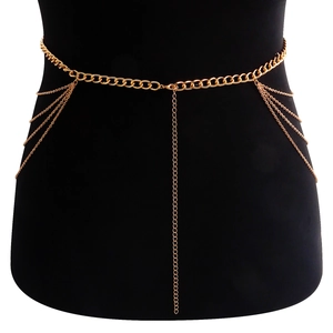 Détail d'une chaîne de taille dorée à plusieurs niveaux avec franges sexy en forme de U