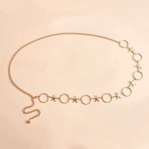 Detail of golden starfish and circular links on a bohemian alloy body chain for women