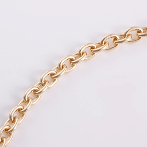 Close-up of polished gold aluminum chain links with reflective mirror finish details