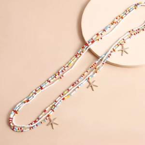 Bohemian multilayer waist chain with colorful beads and gold starfish pendants