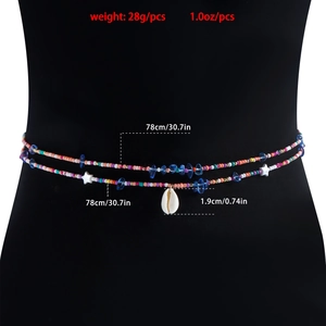 Detail of colorful seed bead waist chains with a natural shell pendant on a black background