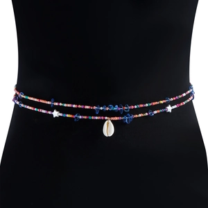 Detail of colorful beaded waist chain with star charms and a white seashell pendant