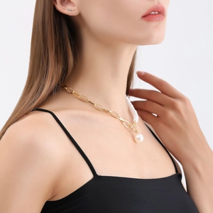 Asymmetric gold link chain necklace with white pearls and OT toggle clasp closure