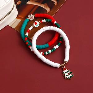 Three-piece Christmas beaded bracelet set with festive Santa and reindeer charms