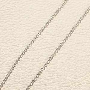 Macro shot of polished silver stainless steel cable chain links for DIY jewelry making