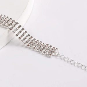 Detail of five-row silver rhinestone choker showing the adjustable extension chain