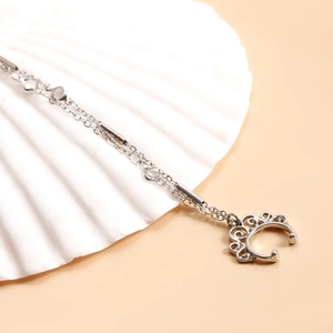 Detailed silver piercing chain with faux diamond and crown-shaped non-pierced clip nose ring