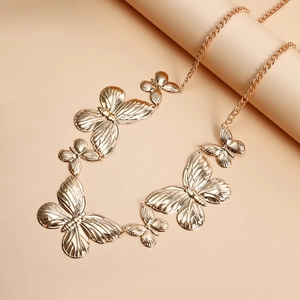 Chaîne de corps papillon dorée pour femmes avec pendentifs papillons multicouches