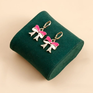 Chic gold alloy hoop earrings with pink and white enamel butterfly bow pendants