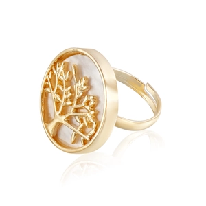 Detailed close-up of golden Tree of Life ring with white mother of pearl inlay and open band