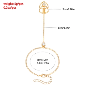 Bracelet bague flèche géométrique dorée avec strass et dimensions détaillées incluses