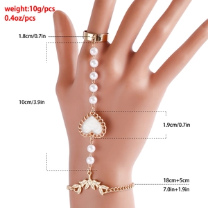 Détail du bracelet bague doré avec pendentif en cœur et dimensions en centimètres