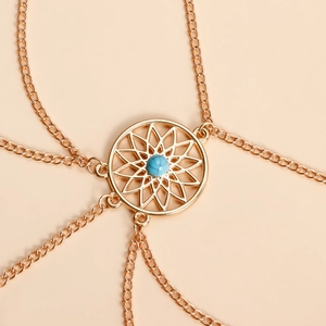 Boho gouden enkelbandje met turquoise steen en geometrisch zonnestraal design