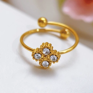 Elegant gold four-leaf clover adjustable ring with sparkling white zircon crystals