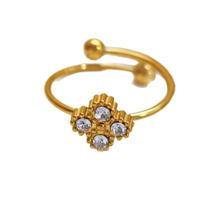 Gold adjustable four-leaf clover ring with sparkling zircon stones in a minimalist style