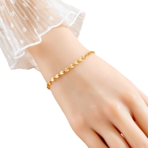 Elegant gold titanium steel clover bracelet with sunburst discs for women stylish jewelry