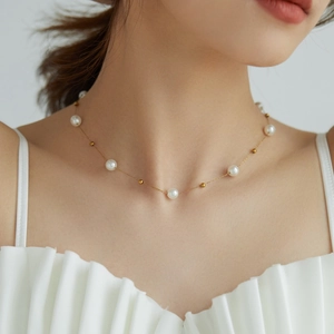 Elegant French style titanium steel necklace with white pearls and small gold beads