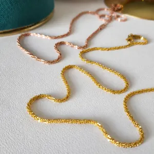 Collane a catena intrecciata in oro 18 carati e oro rosa con chiusura a moschettone