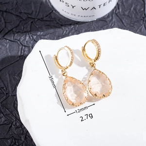 Detailed size view of teardrop pink stone earrings with sparkling micro-pave ear hooks