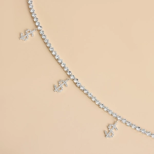 Hiphop silver chain necklace with rhinestone encrusted dollar sign pendants and single row crystals