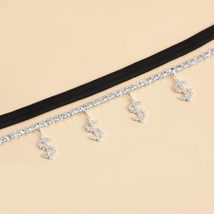 Detail of black elastic choker featuring silver dollar sign charms with sparkling rhinestones