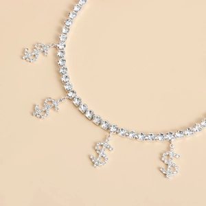 Sexy dollar sign leg chain with sparkling rhinestones and black elastic band for beach fashion