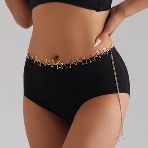 Punk style gold hollow star waist chain accessory for women on black dress
