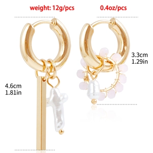 Macro view of crystal woven earrings showing dimensions and asymmetric pearl details