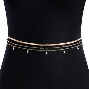 Multi-layer gold body chain featuring flat snake link and white teardrop pearl charms