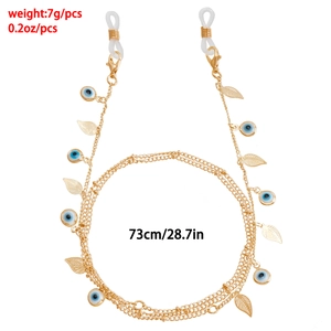 Chaîne à lunettes dorée avec œil porte-bonheur et pendentif feuille, long de 73cm